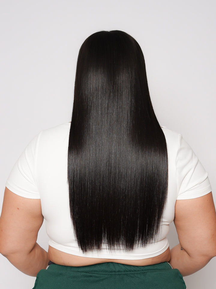 A silky straight HD lace wig, crafted from 100% raw Vietnamese human hair, showing its smooth, flowing texture.