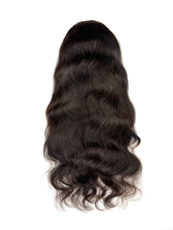 Lace closure wig with a beautiful body wave pattern.